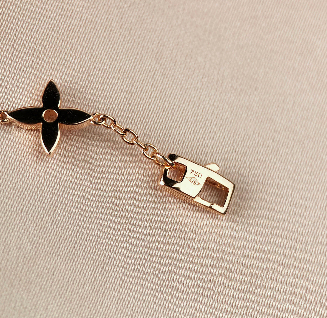 Miro STAR AND SUN 7 MOTIFS GOLD BRACELET