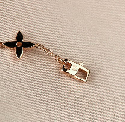 Miro STAR AND SUN 7 MOTIFS GOLD BRACELET