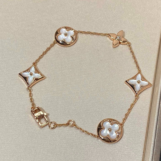 Miro STAR AND SUN 5 MOTIF MOP PINK GOLD BRACELET