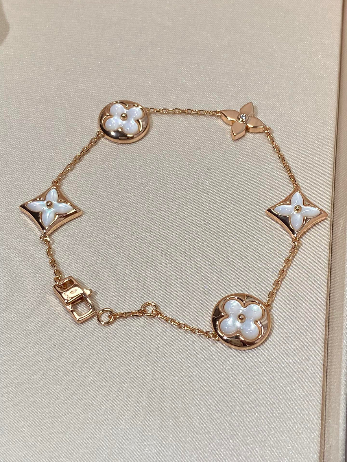 Miro STAR AND SUN 5 MOTIF MOP PINK GOLD BRACELET