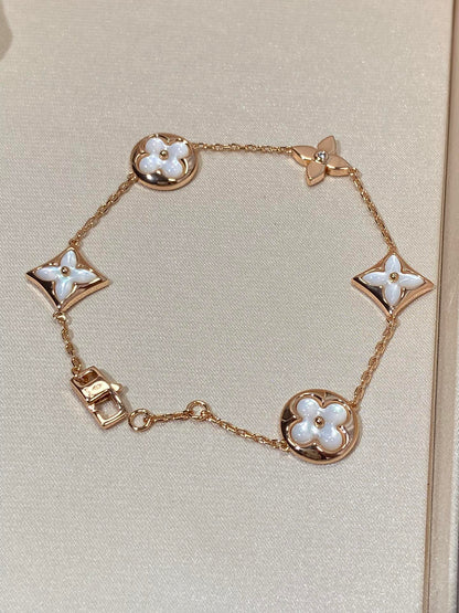 Miro STAR AND SUN 5 MOTIF MOP PINK GOLD BRACELET